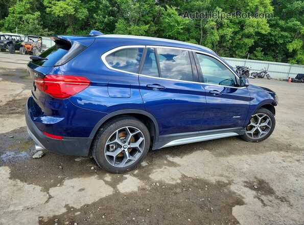 WBXHT3C33GP880665 2016 BMW X1 Blue Rear right