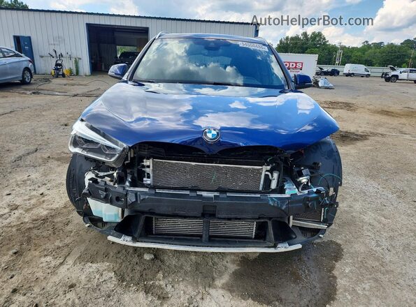 WBXHT3C33GP880665 2016 BMW X1 Blue Front view