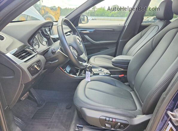 WBXHT3C33GP880665 2016 BMW X1 Blue Front interior view
