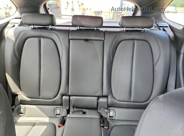 WBXHT3C33GP880665 2016 BMW X1 Blue Rear seats view