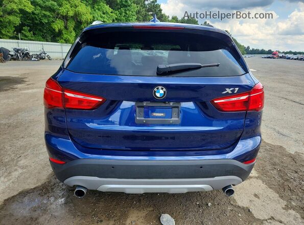 WBXHT3C33GP880665 2016 BMW X1 Blue Rear view