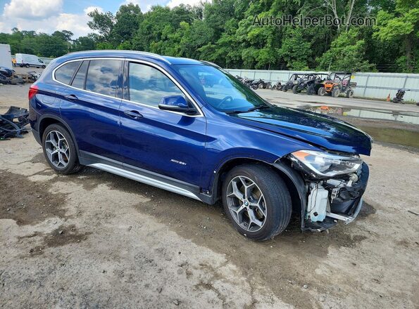 WBXHT3C33GP880665 2016 BMW X1 Blue Front right