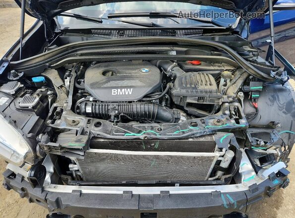 WBXHT3C33GP880665 2016 BMW X1 Blue Engine compartment view
