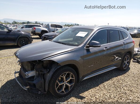 WBXHT3C33H5F73125 2017 BMW X1 Серый Передняя левая четверть