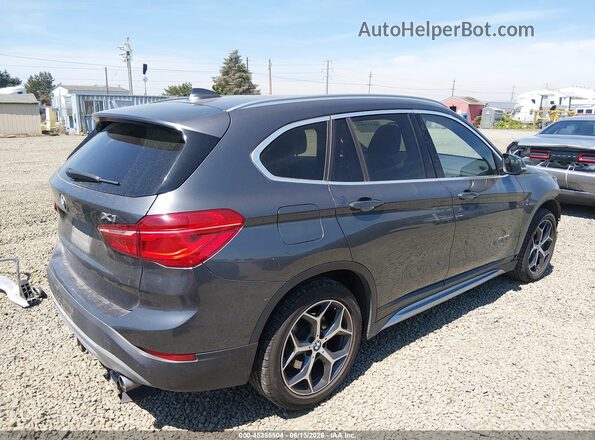 WBXHT3C33H5F73125 2017 BMW X1 Серый Задняя правая четверть