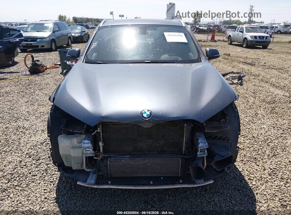 WBXHT3C33H5F73125 2017 BMW X1 Серый Вид задней части салона