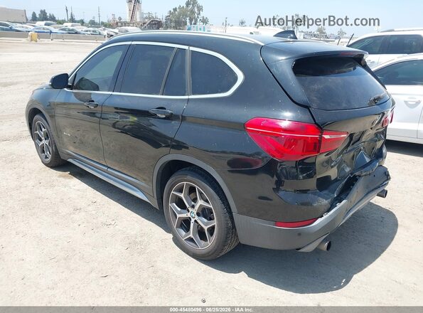 WBXHT3C33H5F81581 2017 BMW X1 Black Tył lewy
