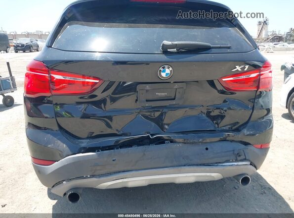 WBXHT3C33H5F81581 2017 BMW X1 Black Widok z przodu