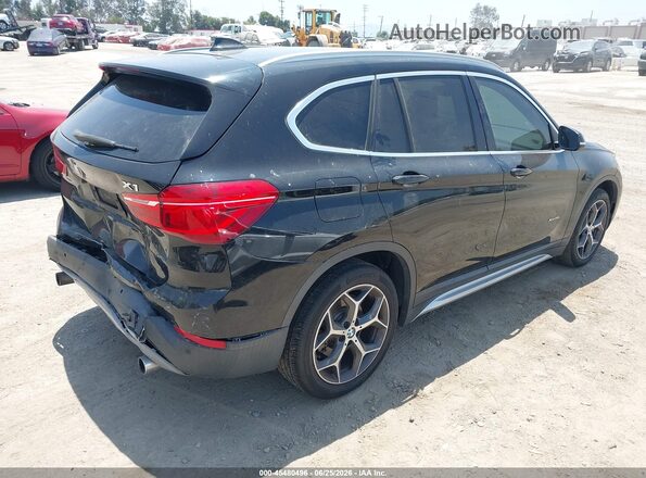 WBXHT3C33H5F81581 2017 BMW X1 Black Tył prawy