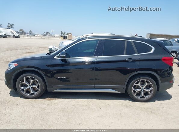 WBXHT3C33H5F81581 2017 BMW X1 Black 