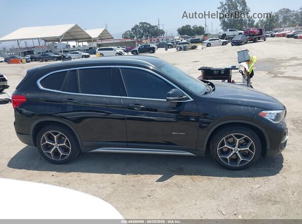 WBXHT3C33H5F81581 2017 BMW X1 Black Widok wnętrza 360 stopni