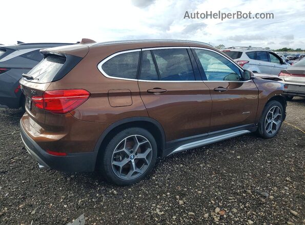 WBXHT3C33H5F82651 2017 BMW X1 Brown 