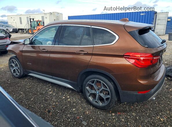 WBXHT3C33H5F82651 2017 BMW X1 Brown 