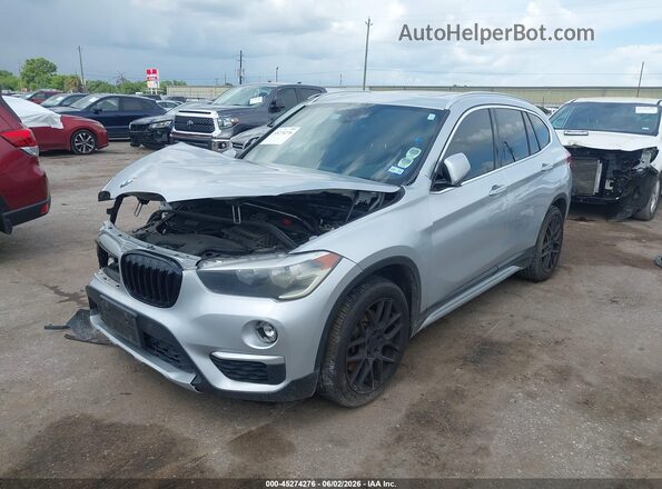WBXHT3C33J5K27823 2018 BMW X1 Silver Առջևի ձախ երեք քառորդ տեսարան