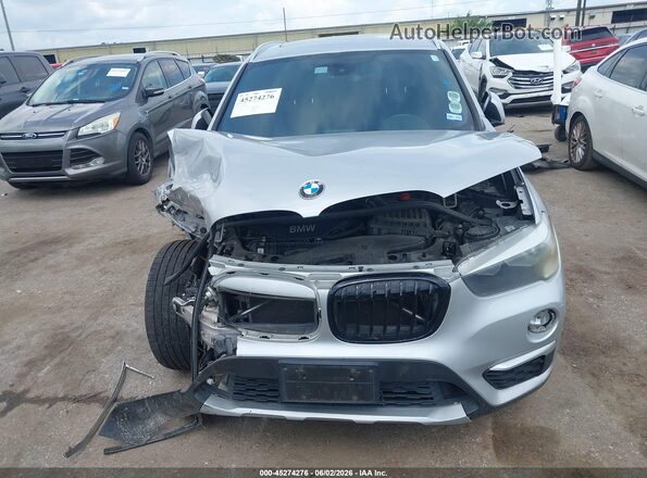 WBXHT3C33J5K27823 2018 BMW X1 Silver Սալոնի հետևի տեսք
