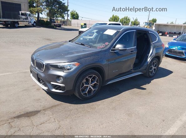 WBXHT3C33J5K31144 2018 BMW X1 Gray წინა მარცხენა ხედი სამი მეოთხედიდან