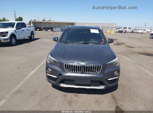 WBXHT3C33J5K31144 2018 BMW X1 Gray უკანა სალონის ხედი