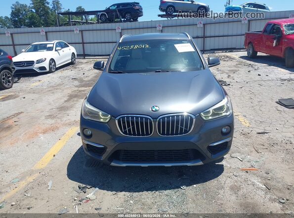 WBXHT3C33J5L24200 2018 BMW X1 Gray Սարքավորումների վահանակի տեսք