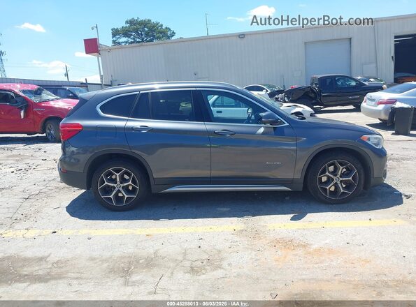 WBXHT3C33J5L24200 2018 BMW X1 Gray Սալոնի հետևի տեսք