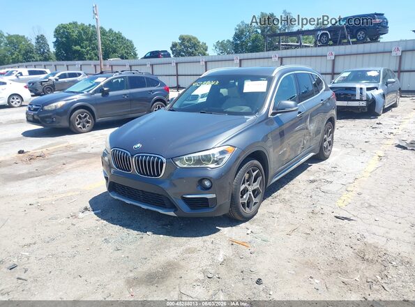 WBXHT3C33J5L24200 2018 BMW X1 Gray Առջևի ձախ երեք քառորդ տեսարան