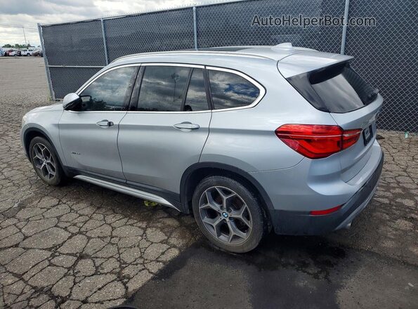 WBXHT3C34G5E52411 2016 BMW X1 Silver Rear left