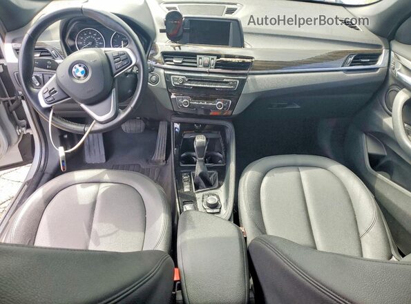 WBXHT3C34G5E52411 2016 BMW X1 Silver Dashboard view
