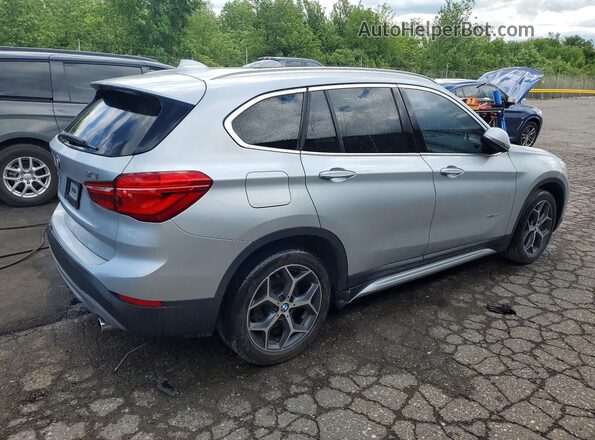 WBXHT3C34G5E52411 2016 BMW X1 Silver Rear right