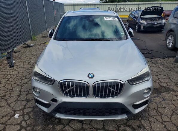 WBXHT3C34G5E52411 2016 BMW X1 Silver Front view