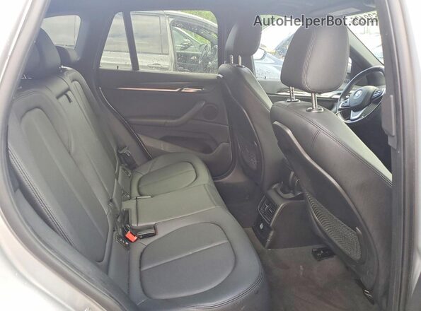 WBXHT3C34G5E52411 2016 BMW X1 Silver Rear interior view