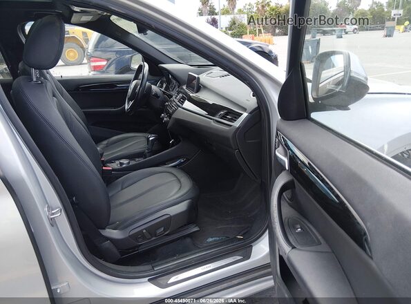 WBXHT3C34G5E55888 2016 BMW X1 Gray წინა სალონის ხედი