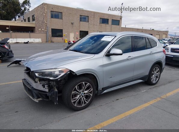 WBXHT3C34G5E55888 2016 BMW X1 Gray წინა მარცხენა ხედი სამი მეოთხედიდან