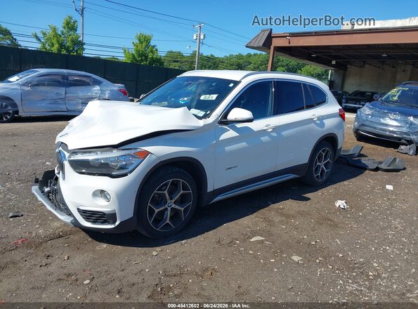 WBXHT3C34G5F64884 2016 BMW X1 White Vista tres cuartos delantera izquierda