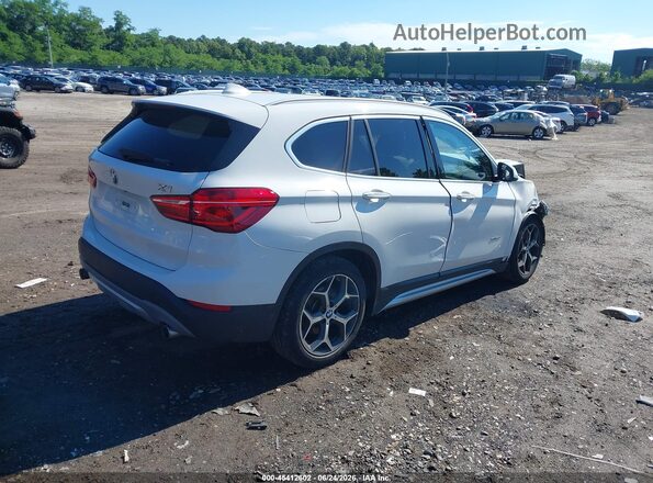 WBXHT3C34G5F64884 2016 BMW X1 White Trasero derecho