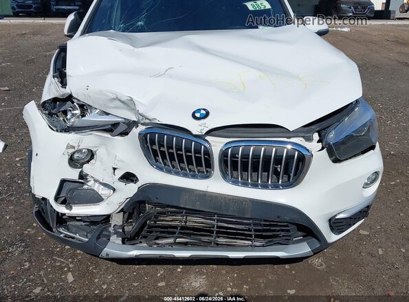 WBXHT3C34G5F64884 2016 BMW X1 White Vista frontal