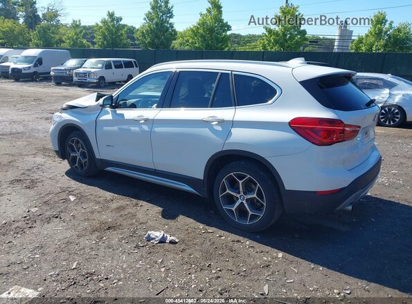 WBXHT3C34G5F64884 2016 BMW X1 White Trasero izquierdo