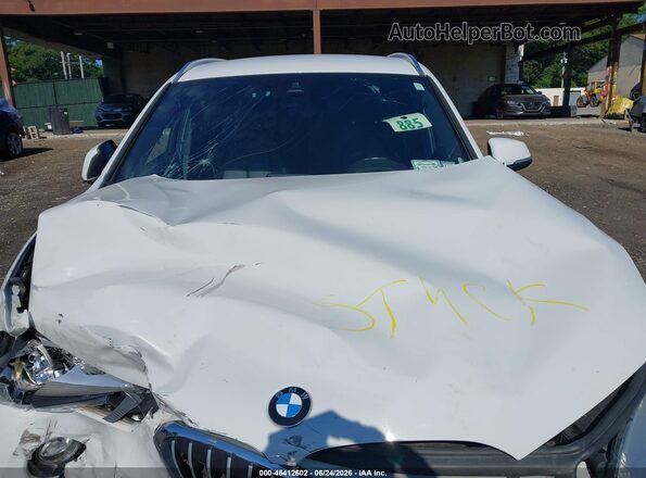 WBXHT3C34G5F64884 2016 BMW X1 White Vista trasera