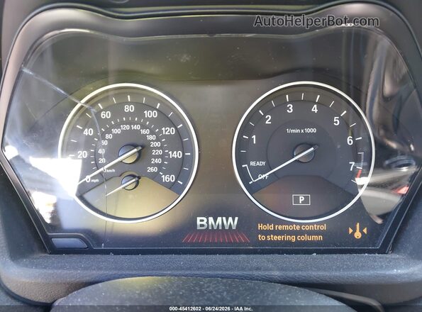 WBXHT3C34G5F64884 2016 BMW X1 White Vista de los asientos traseros