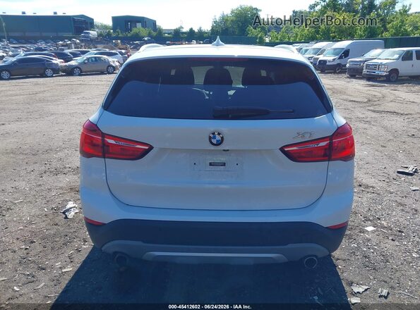 WBXHT3C34G5F64884 2016 BMW X1 White 