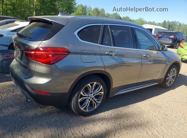 WBXHT3C34G5F65551 2016 BMW X1 Gray 