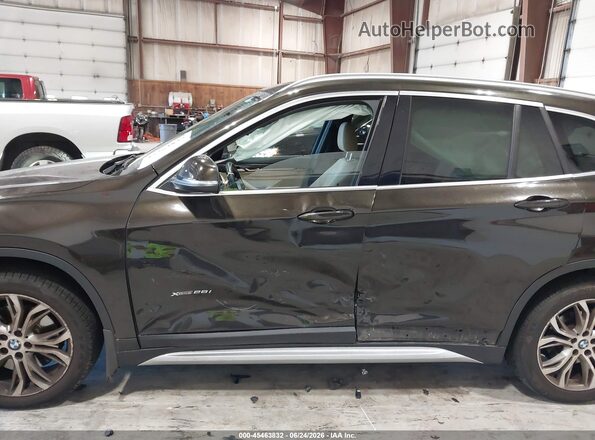 WBXHT3C34H5F85641 2017 BMW X1 Коричневый Вид спереди