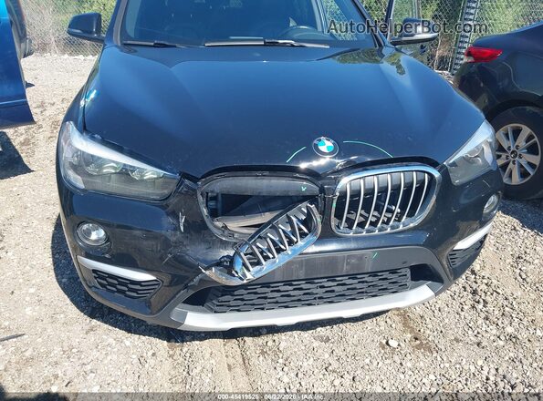 WBXHT3C34J5L30832 2018 BMW X1 Black Vista frontal