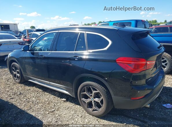 WBXHT3C34J5L30832 2018 BMW X1 Black Vista interior de 360 grados