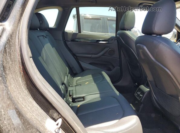 WBXHT3C35G5E51607 2016 BMW X1 Black Հետևի նստատեղերի տեսք