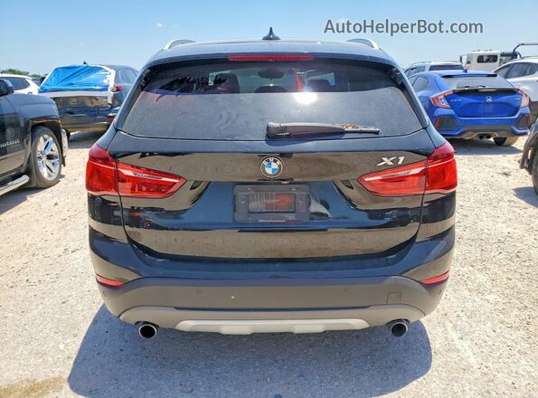 WBXHT3C35G5E51607 2016 BMW X1 Black Հետևի տեսք