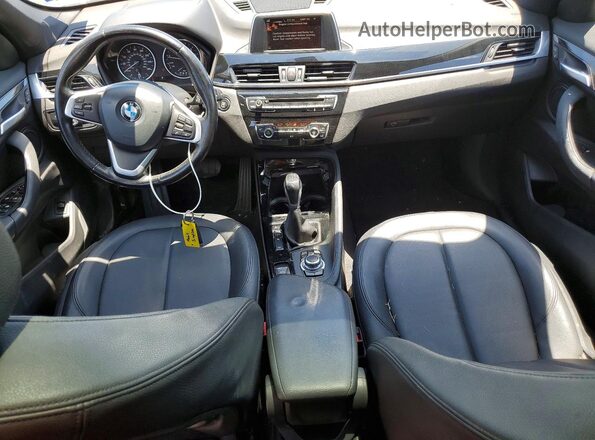 WBXHT3C35G5E51607 2016 BMW X1 Black Առջևի վահանակի տեսք