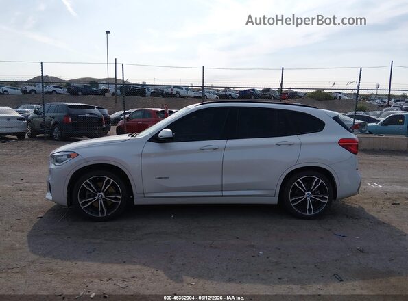 WBXHT3C35G5F64408 2016 BMW X1 White Սալոնի հետևի տեսք