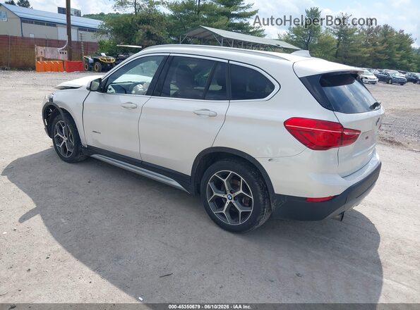 WBXHT3C35H5F73398 2017 BMW X1 White Rear left