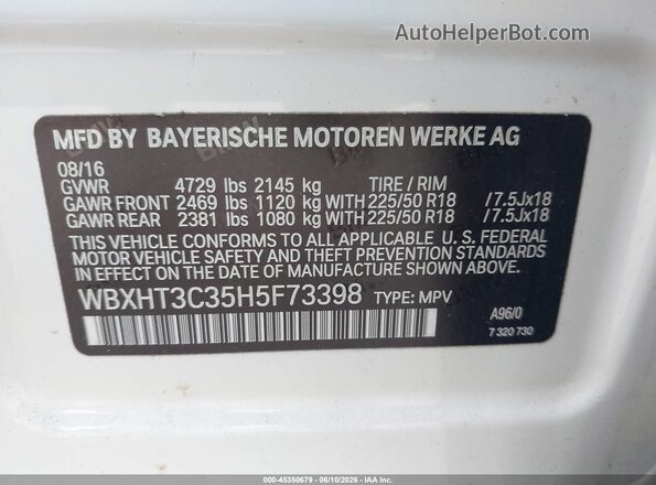 WBXHT3C35H5F73398 2017 BMW X1 White Engine compartment view