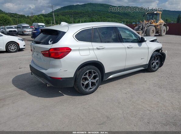 WBXHT3C35H5F73398 2017 BMW X1 White Rear right