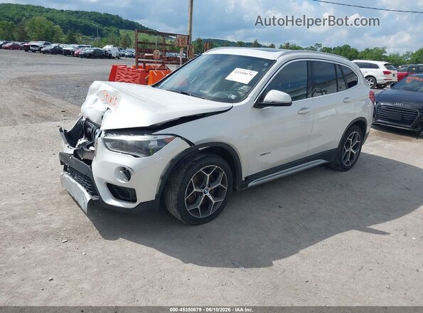 WBXHT3C35H5F73398 2017 BMW X1 White Front left